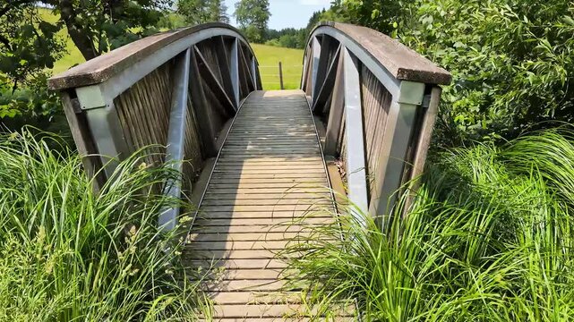 Footbridge over the Miternacher Ohe in the Bavarian Forest Germany.