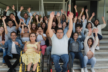 Diverse group of latin people applauding after successful conference in convention center in Mexico...