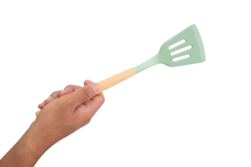 hand holding a spatula with a white isolated background