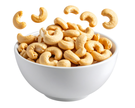 Cuenco de cerámica blanca con anacardos derramándose, fondo transparente