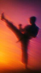 Fototapeta premium Dynamic silhouette against sunset