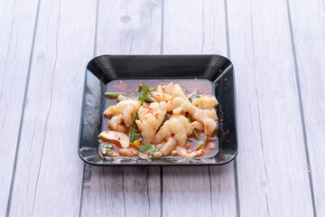 A spicy, sour, and salty meat salad.