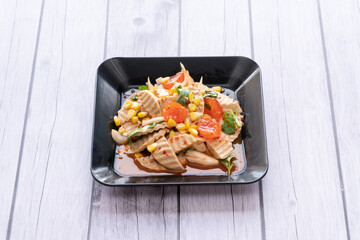 A spicy, sour, and salty meat salad.