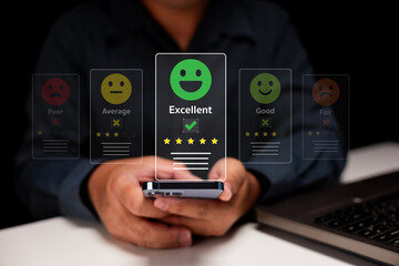 A person uses a smartphone to rate a service or product as 
