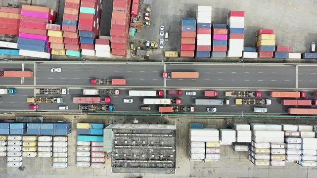 Busy logistics park showcases efficient transport and cargo operations during peak hours in urban area