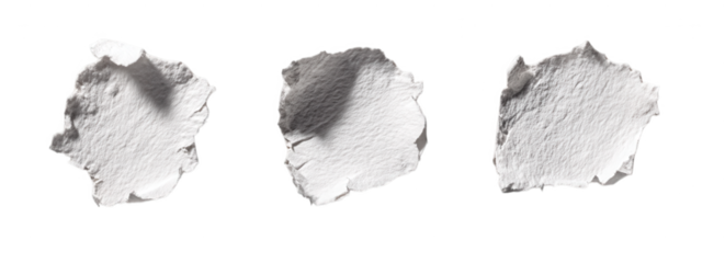 Three textured white paper fragments with torn edges on a black background.