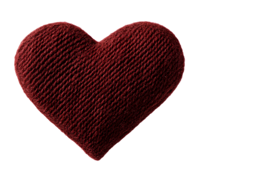 A soft plush and warm handcrafted red heart shaped textile with a knitted texture conveying a sense of love and int y