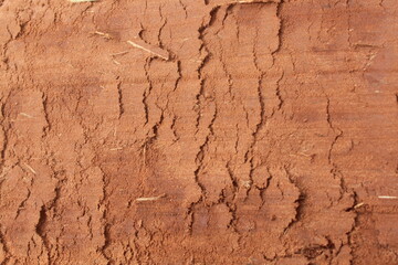 Ground Texture After Agricultural Machinery Passage: Dry Layered Soil with Clay Characteristics.
