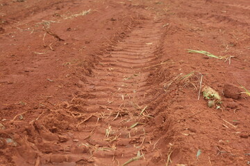 soil in the field, Plowed field with various tractor tracks.