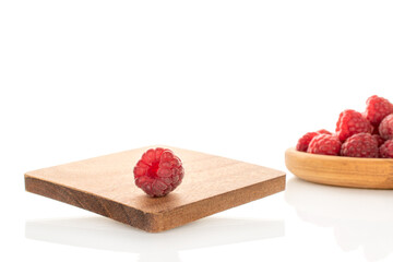 Fresh sweet raspberries isolated on white background, macro.	
