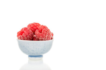 Fresh sweet raspberries isolated on white background, macro.	
