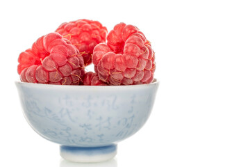 Fresh sweet raspberries isolated on white background, macro.	
