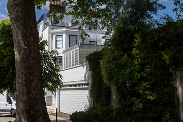 London, UK, 7 May 2025,  White Georgian house Grove Lodge with commemorative plaque for George du Maurier, Hampstead, London