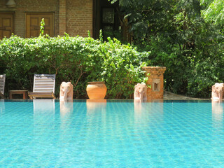 Tranquil swimming pool at a hotel in Southeast Asia