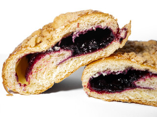 Jagodzianki, buns filled with blueberries in cross-section