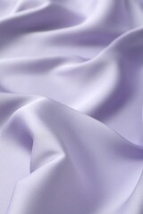 Crumpled violet silk fabric as background, closeup