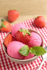 Refreshing sorbet, strawberries and mint on table, closeup