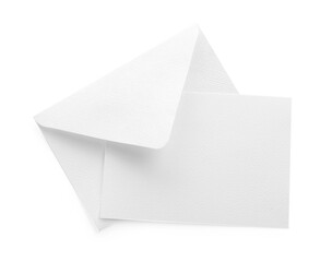 Blank invitation card and envelope isolated on white, top view. Space for design