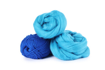 Felting wool and knitting yarn isolated on white