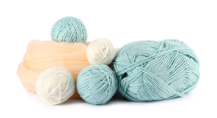 Felting wool and knitting yarn isolated on white