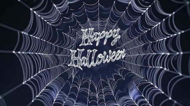 An amazing spider web is showcased, glistening with dew in the morning light with words Happy Halloween. The well-defined strands create a mesmerizing pattern that highlights nature's artistry