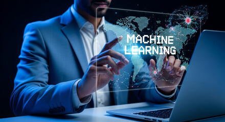 Man interacting with machine learning interface on a screen with a laptop in the foreground view