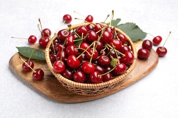 Fresh ripe cherries on light table, closeup
