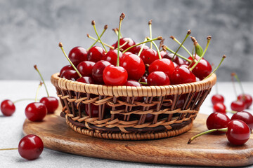 Fresh ripe cherries on light table, closeup