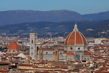 Fototapeta premium View of Florence in Central Italy with Cathedral with Dome of Brunelleschi Architect and Italian Apennines Mountains