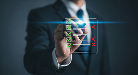 Businessman checking off items on a digital checklist task