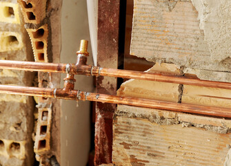 Copper pipes for water supply, ready for connection during a complete renovation of a home...