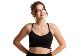 Fototapeta premium Confident young woman in black fitness outfit smiling at camera isolated on transparent png background
