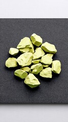 Pale Yellow Uranium Ore on Black Velvet Background