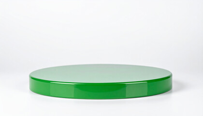 Glossy green round podium against white backdrop. Product presentation display. Empty pedestal.