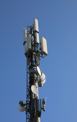 high antenna of the repeater of the cellular network with many devices of reception transmission...