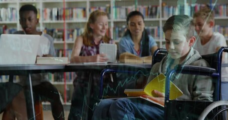 Boy in wheelchair reading notebook for education while animated graphs appearing over classmates - Powered by Adobe