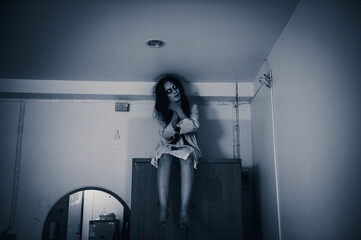 Portrait of asian woman make up ghost,Scary horror scene for background,Halloween festival...