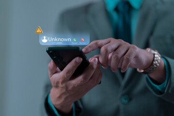 Phone call from unknown number late at night. Scam, fraud or phishing with smartphone concept. Prank caller, scammer or stranger. Man answering to incoming call. Hoax person with fake identity.