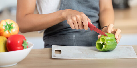 Couple Cooking Together. Preparing Fresh Vegetables in a Modern Kitchen.
