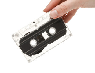 Woman with audio cassette on white background, closeup