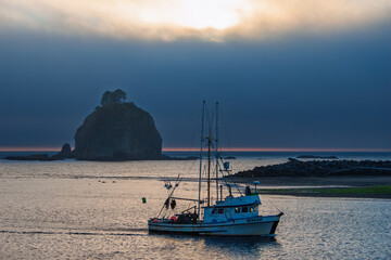 boat on the sea at sunset 