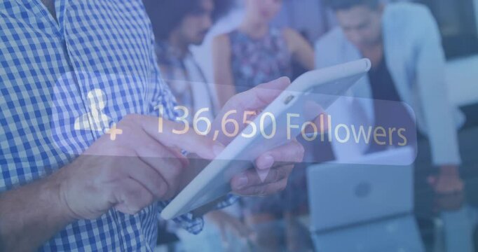 Man tapping tablet and animating follower count graphic climbing showcasing social media growth
