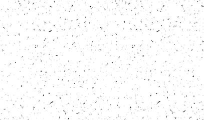 White background with scattered black speckles and dashes texture