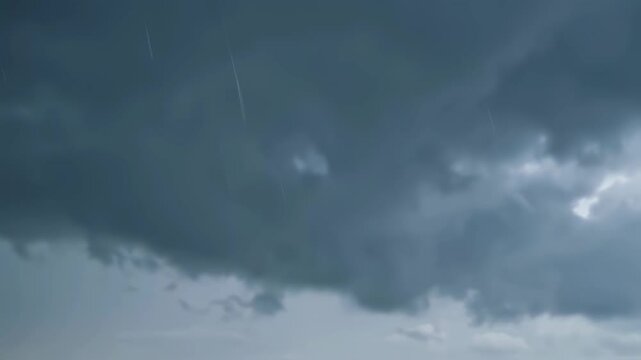 Dramatic storm clouds rolling in with lightning strikes in the sky
