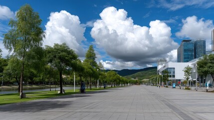 Clear blue sky and white clouds create a tranquil setting at West Lake in Hangzhou, with trees framing a stunning urban backdrop