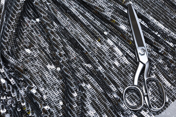 Reflective metallic spangle fabric with dazzling surface—ideal for glam fashion, festive design,...