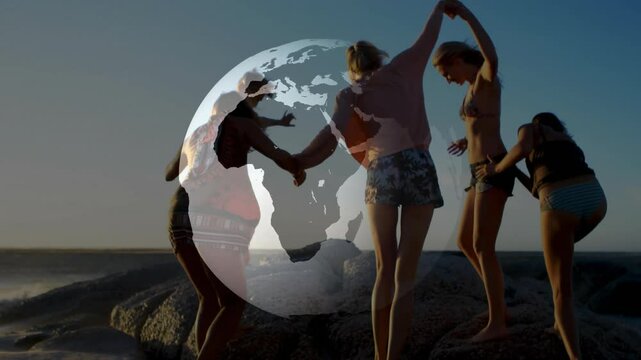 Arriving women linking hands on rock for stability testing exercise under transparent globe overlay