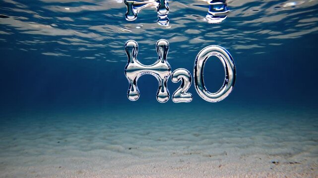 Chemical symbol h2o of water molecule floating dynamically underwater, revealing transparent structure against sandy ocean floor with blue marine environment