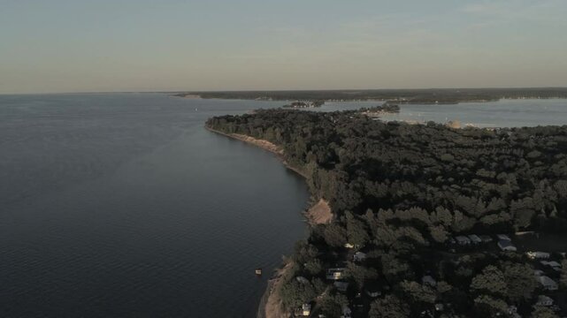 Drone over Lake Ontario looking east towards Sodus Point in summer