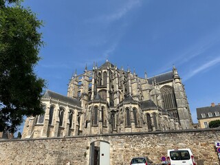 Charming French old town with half-timbered houses, gothic churches, and historic city walls – a...